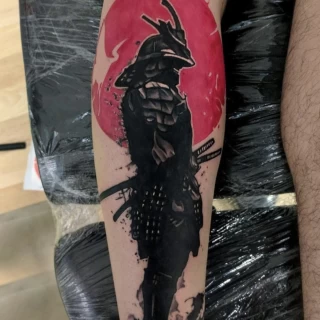 Jarek - guest artist - samourai with sun - japanese styletattoo - black and red - the black hat tattoo Nice - 2025 - The Black Hat Tattoo