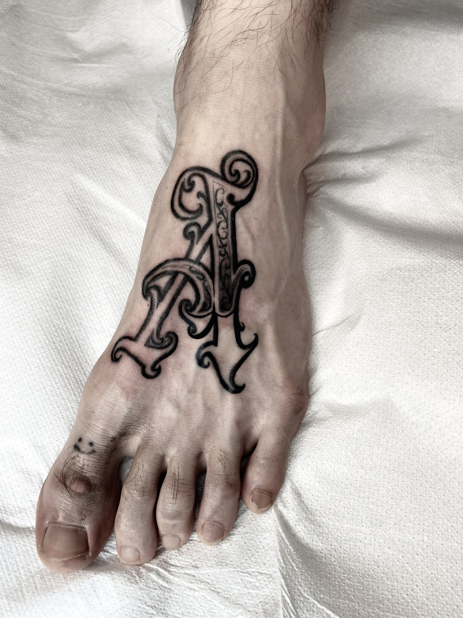 A - The Black Hat Tattoo