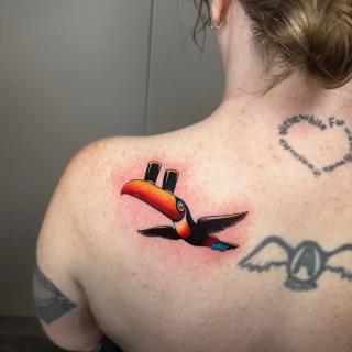 Tatouage de Toucan -  - Tatouage Irlandais et Celtique - Black Hat Tattoo Nicesur les cotes - Tatouage Ornemental - Black Hat Tattoo Nice  - tatouage Nice - The Black Hat Tattoo