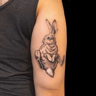 Animal Tattoo - Rabbit or Hare Tattoo on upper arm - Black Hat Tattoo - The Black Hat Tattoo