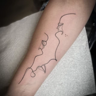 The Black Hat Tattoo Dublin 2022 - Minimal fine lines tattoo one line face - The Black Hat Tattoo