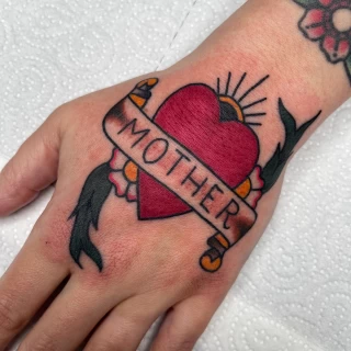 Jackie - resident artist - the black hat tattoo Dublin 2023  - heart _ mother tattoo IMG_9808 - The Black Hat Tattoo